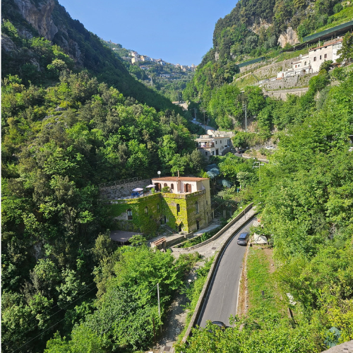 A green valley with hillside villages